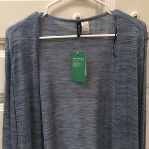 Open front blue cardigan.